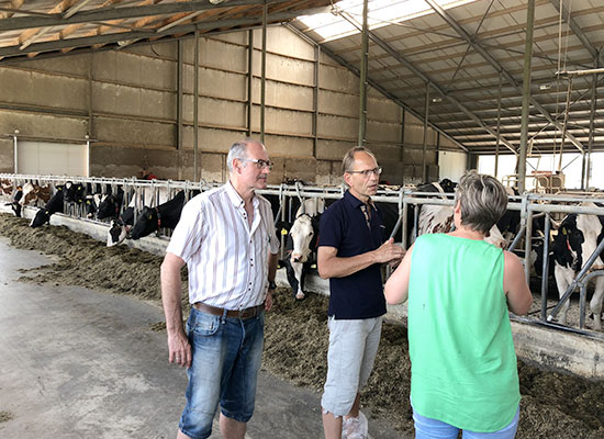 With international visitors on a farm visit